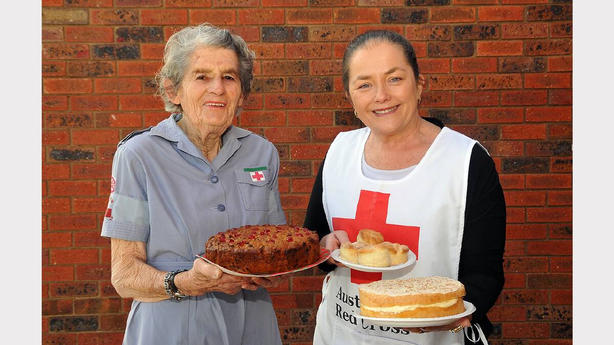 Elva Raggatt and Mandy Hancock with cakes ready for the stall next Friday, which will conclude a big week of centenary celebrations.