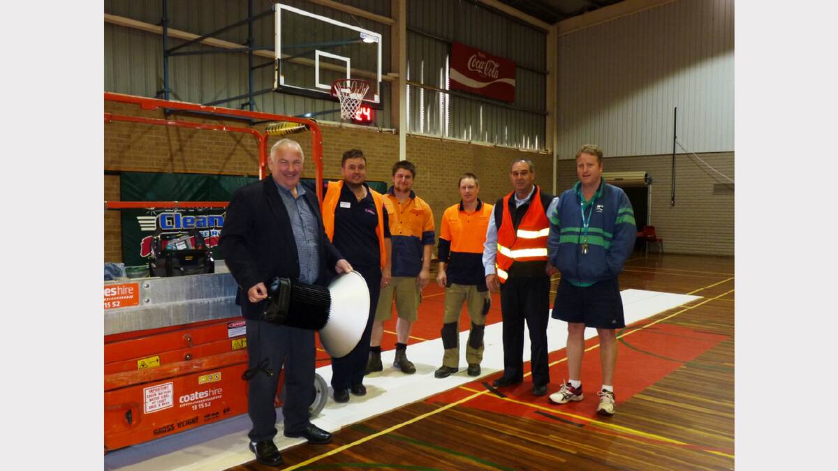 Northern Grampians Shire Mayor Cr Kevin Erwin, Marc Collins (Middendorp Electrics), Cameron Potter, Mathew Skinner (WW & KF Skinner), Northern Grampians Shire Council Building Projects Officer John Kindred and Leisure and Recreation Coordinator Marc Brilliant with the new basketball stadium lights.