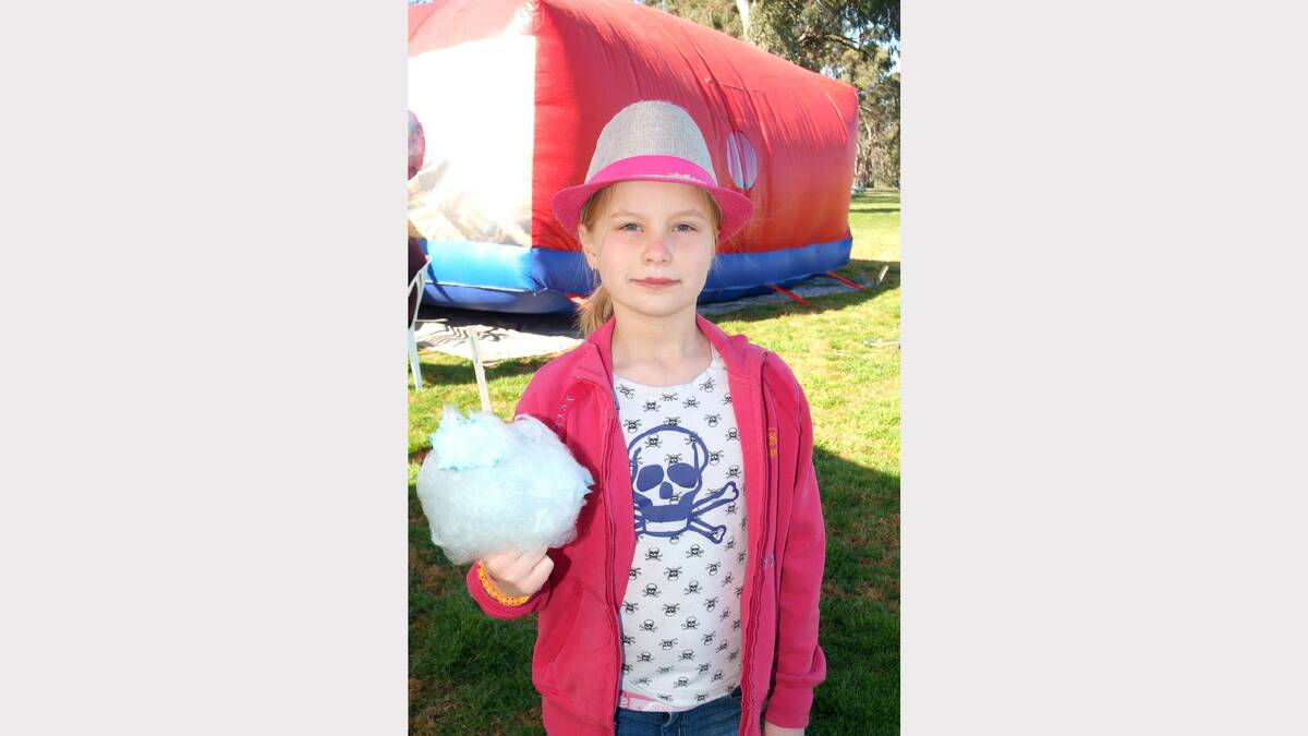 Ashley, aged 10 of Great Western, with some fairy floss.