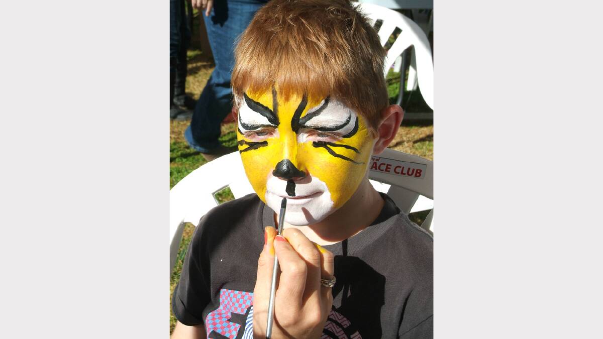 Jack of Stawell has his face painted during the Family Fun Day at the Stawell Racecourse.