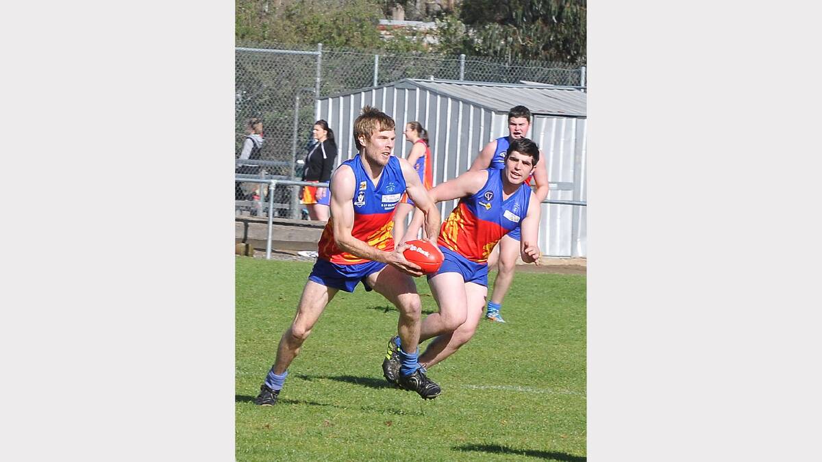 Great Western's Danny Grellett breaks clear with support from Isaac Debono in Saturday's clash.