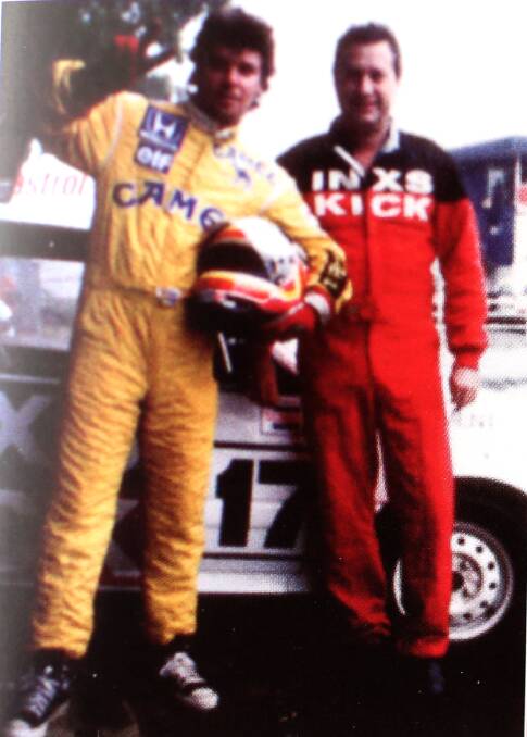Tim Farriss with race car driver David Clement during the track day at Amaroo Park Raceway in 1989. Picture: Supplied