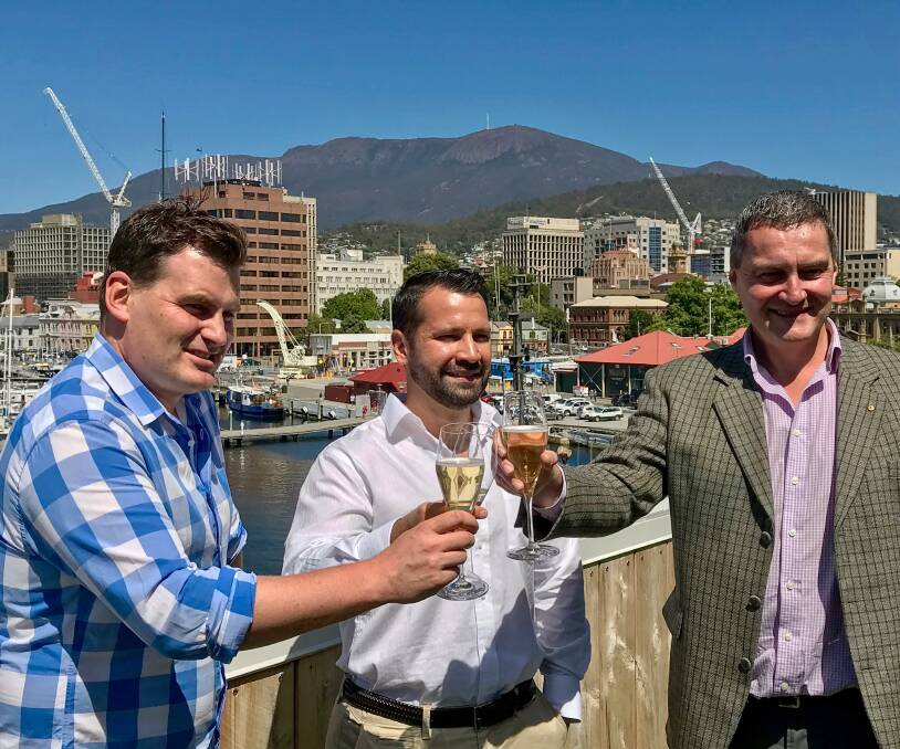WELCOMING: Tourism Industry Council of Tasmania's Luke Martin, Rafael Manzanilla with Rodney Croome. Picture: Supplied