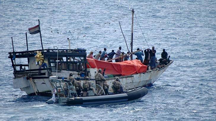 Increasing in prevalence and scope for targets ... a boarding party from HMAS Stuart comes alongside a dhow which had been seized by Somali pirates earlier this year.