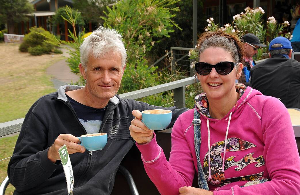 Dutch tourists Hans Kooij and Barbara Neidhofen enjoy a warm cup of coffee while taking in the beautiful surroundings.