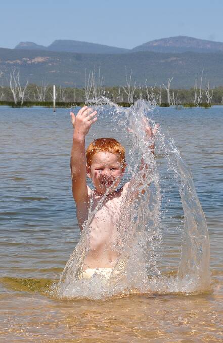 Cooper splashes about the pristine water at Lake Fyans. 