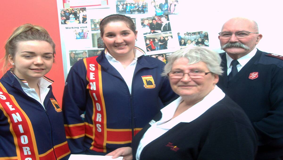 Stawell Secondary College students Phoebe and Mikaela are pictured with Christine and Ken Agnew from the Stawell Salvation Army. 