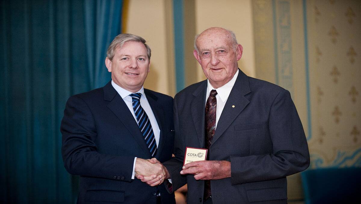 Stawell's Don Webb (right) receives his Senior Achiever Award from Minister for Ageing David Davis on Monday. 