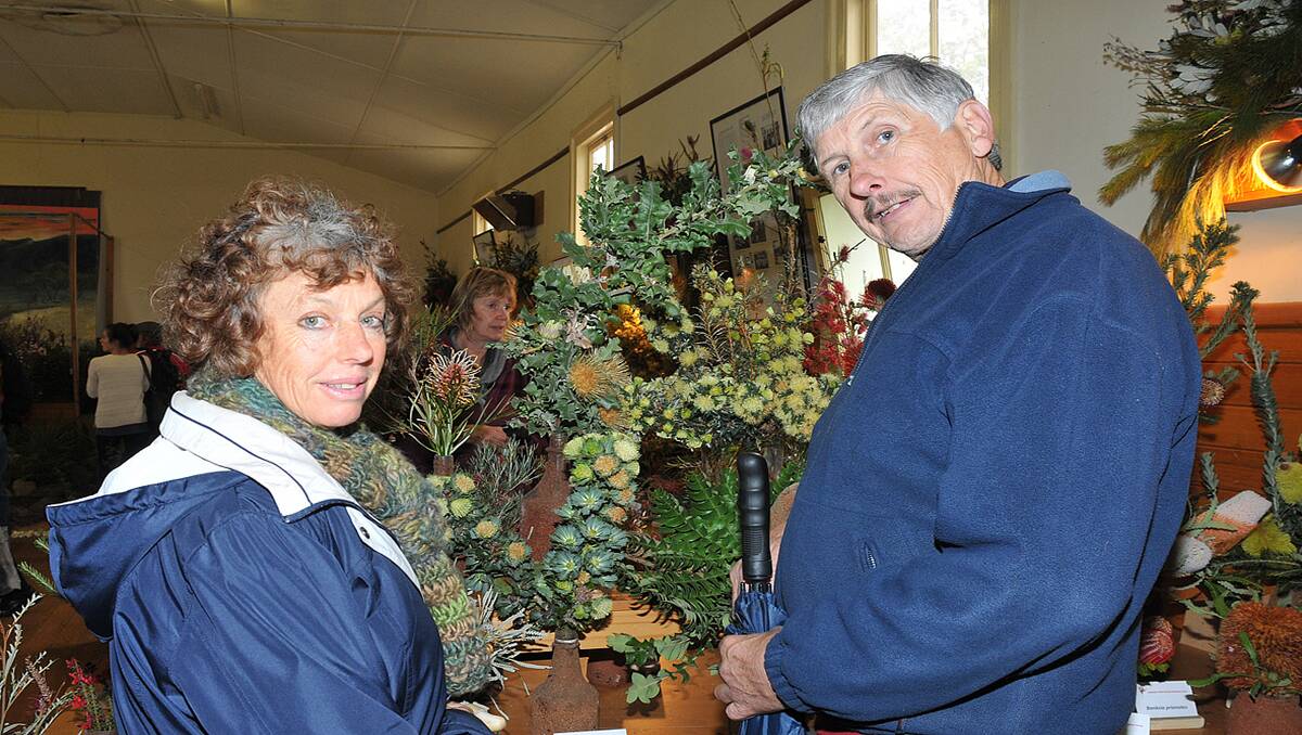 Hundreds of visitors flocked to the Pomonal Hall to view the native flowers on display, including Helen and Stewart Laxton. Picture: MARK McMILLAN