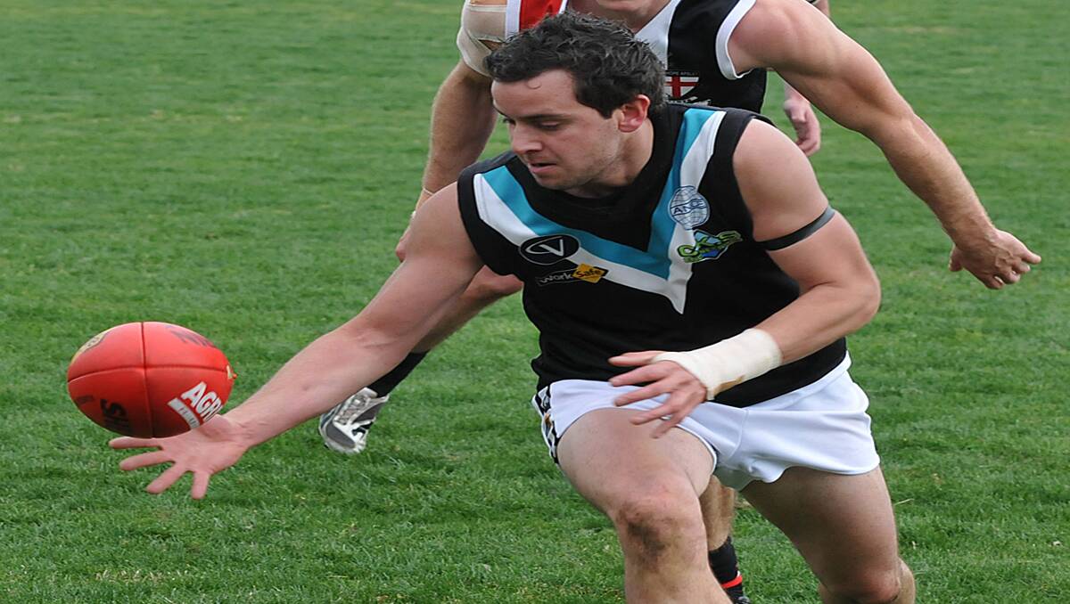 Swifts Adam McGaffin led his Edenhope-Apsley opponent to the ball on this occasion in the preliminary final clash at Natimuk on Saturday. For Swifts, it was the end for season 2012 when they suffered a 57 point loss to the Saints. Picture: MARK McMILLAN