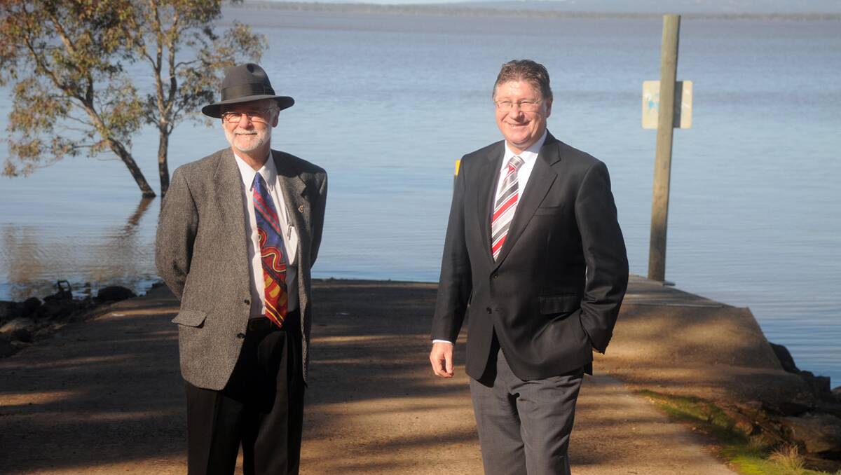Former GWM Water chairman Barry Clugston and Minister for Ports Dr Denis Napthine, are pictured at the Lake Lonsdale boat ramp during a visit in July, 2011, when an announcement was made that $42,000 would be spent on major upgrades. Questions are now being asked why the works are not complete. 