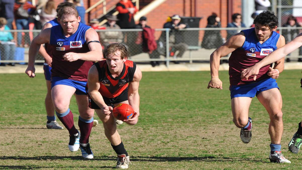 Cam Kimber in action for Stawell Warriors against Horsham during the 2012 season. Kimber had a solid year through the midfield, trying his best every week. Picture: MARK McMILLAN 