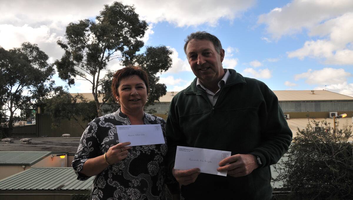 Katrina Slorach (Navarre Netball Club) and Terry May (Pomonal Fire Brigade) with their grants.