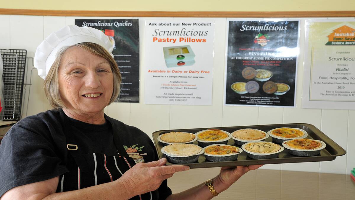 Concongella resident, Nancy Gibson, whose business Scrumlicious has grown enormously from humble beginnings, is pictured with her award winning pies from the Great Aussie Pie competition. Picture: KERRI KINGSTON