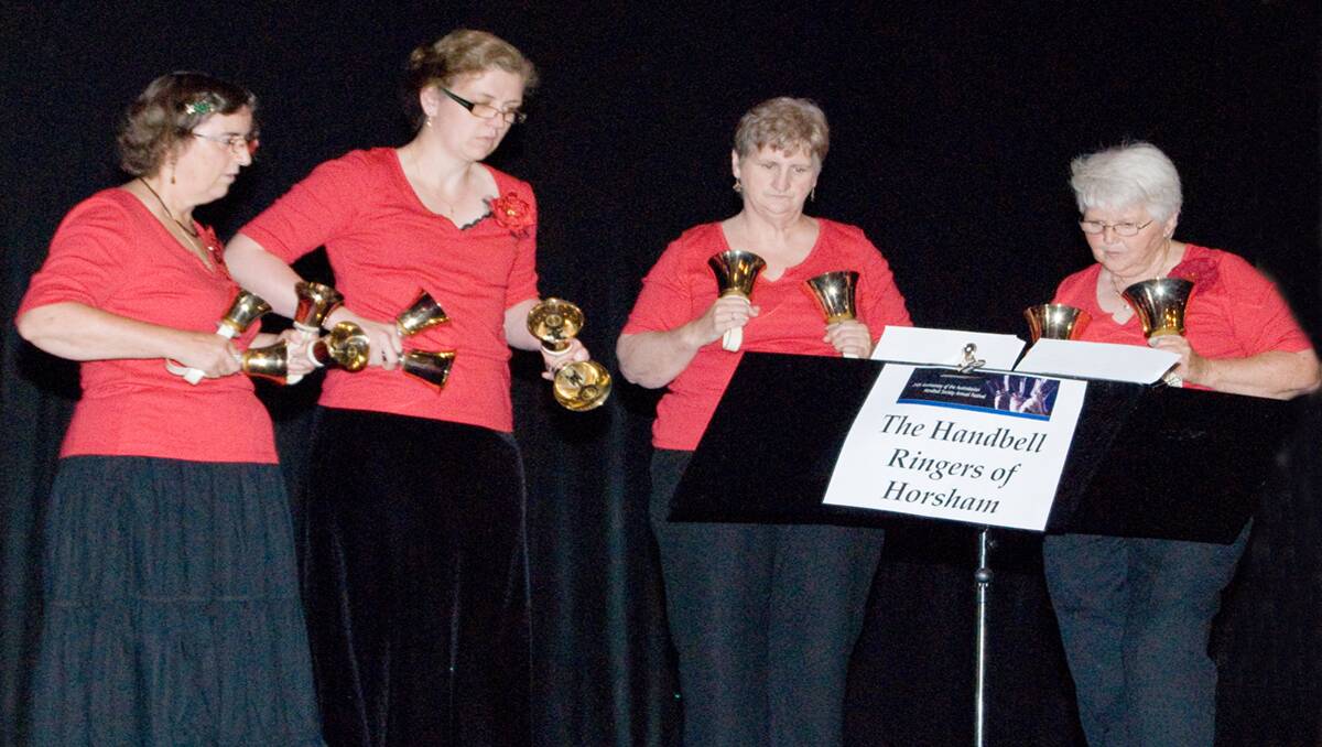 Members of the Handbell Ringers of Horsham L-R Susan Dumill, Angela Matheson, Margaret Raymer and Eva Seenstra will perform at the Christmas Tree Festival in Stawell in December. 
